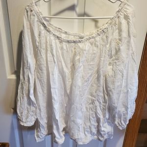 Blouse can go over shoulder